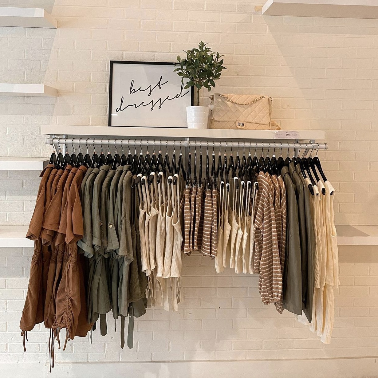 Clothing Rack with PRIMP clothing hanging