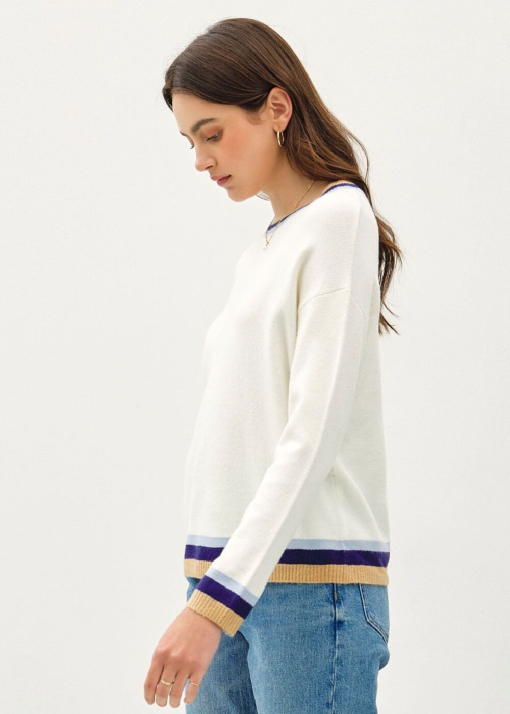 CREAM SWEATER WITH BLUE, PURPLE, AND GOLD ACCENT STRIPE TRIM